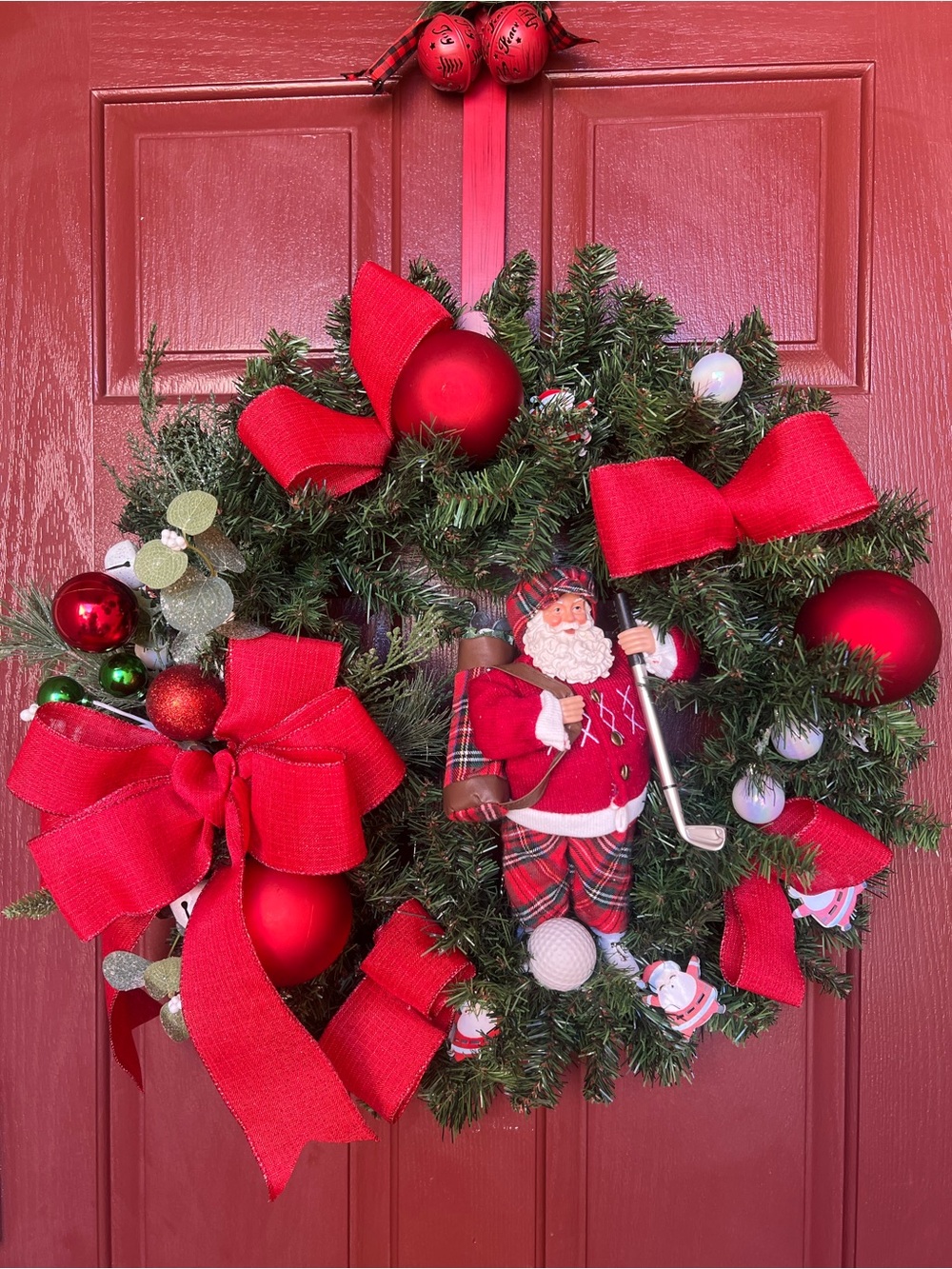 Festive Red Holiday Wreath with Santa Golf Figurine